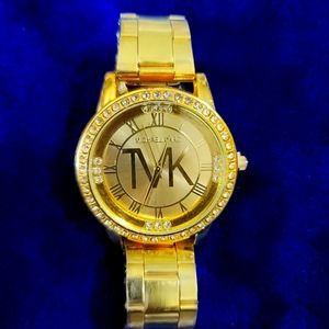 New watch bracelet opens and closes to fit one size It has diamonds around the